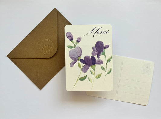 Carte de remerciement 'Merci' avec fleurs violettes aquarelle, enveloppe kraft, design élégant
