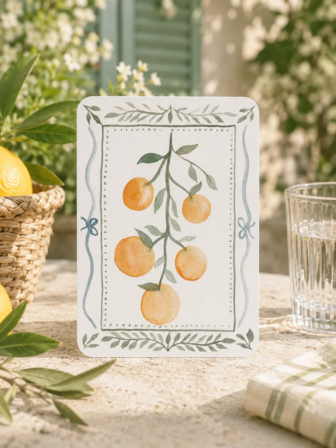 Carte décorative avec oranges et feuilles, style aquarelle, idéale pour décoration intérieure